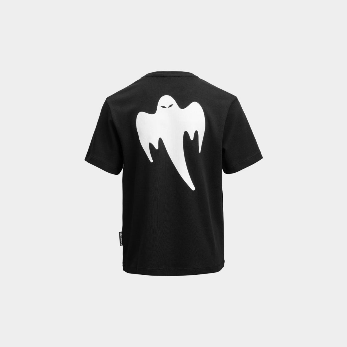 A black short-sleeve t-shirt shown from the back, featuring a large white ghost graphic with a small black eye detail, set against a light gray background.