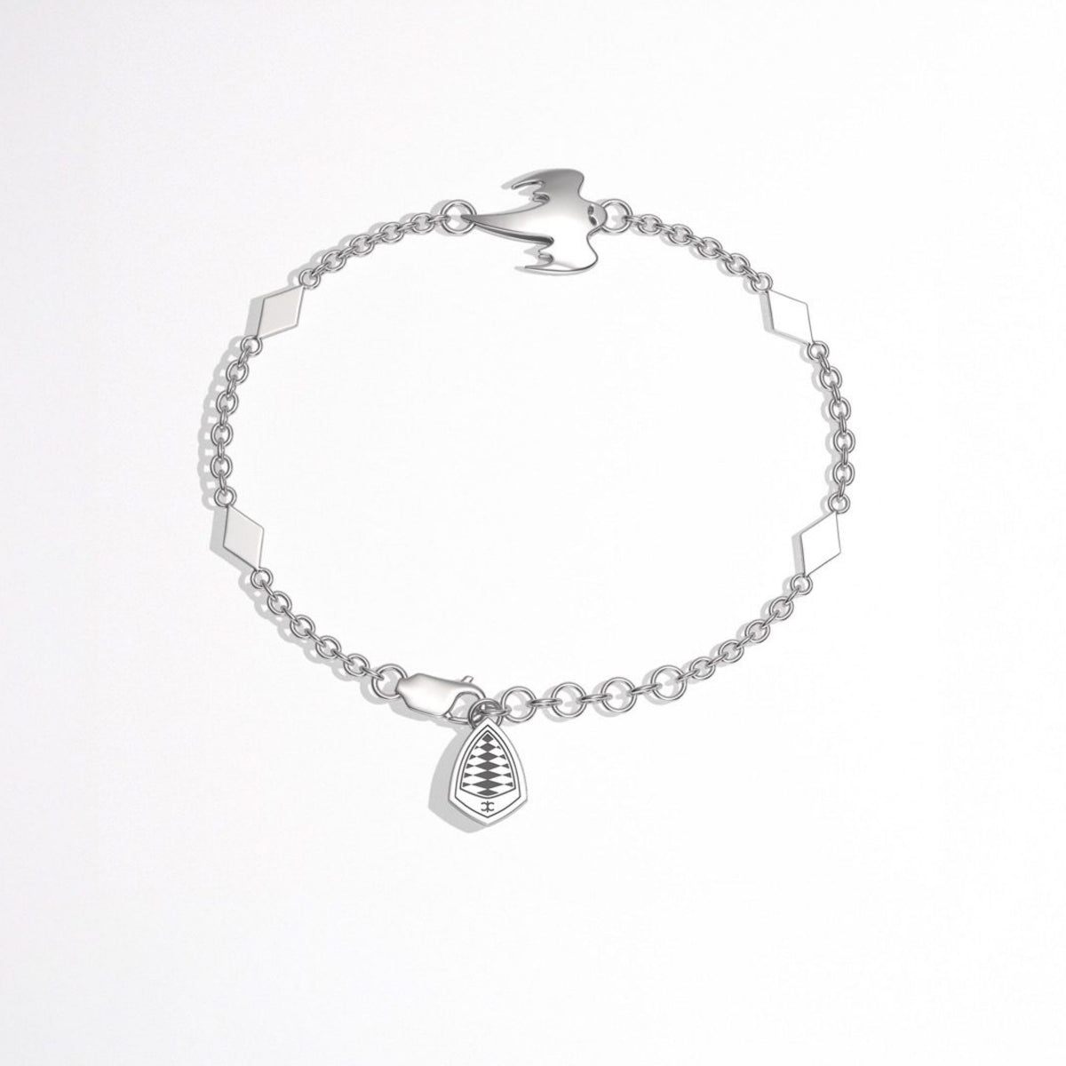A Koenigsegg silver crest bracelet with geometric diamond-shaped links, a small crest, and a silver ghost linking pendant.