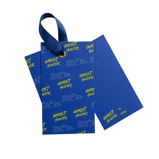 Blue gift bag with 'Ghost Hunter' text and car graphics on a white background