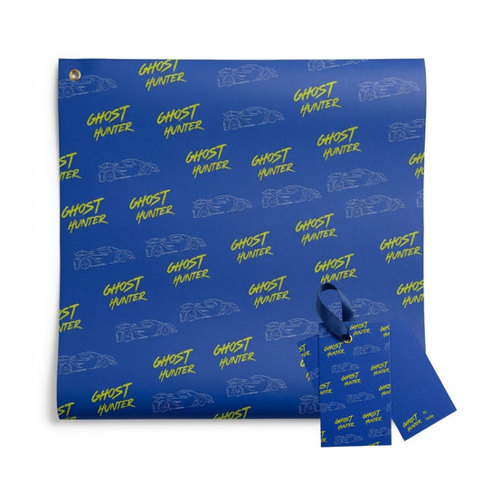 Blue paper with 'Ghost Hunter' text and car graphics on a white background