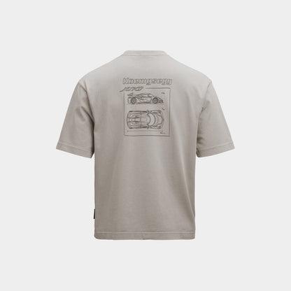 Beige t-shirt with a Koenigsegg Jesko grapic on the back, on a white background